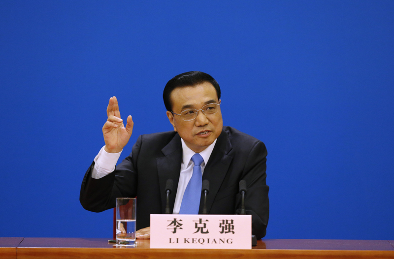 3月15日，國務院總理李克強在北京人民大會堂與中外記者見面，并回答記者提問。 新華社記者 沈伯韓 攝