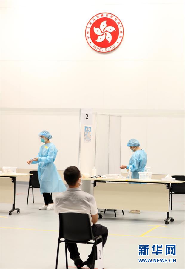 （圖文互動(dòng)）（2）特寫：新冠病毒普檢首日，香港市民踴躍參與