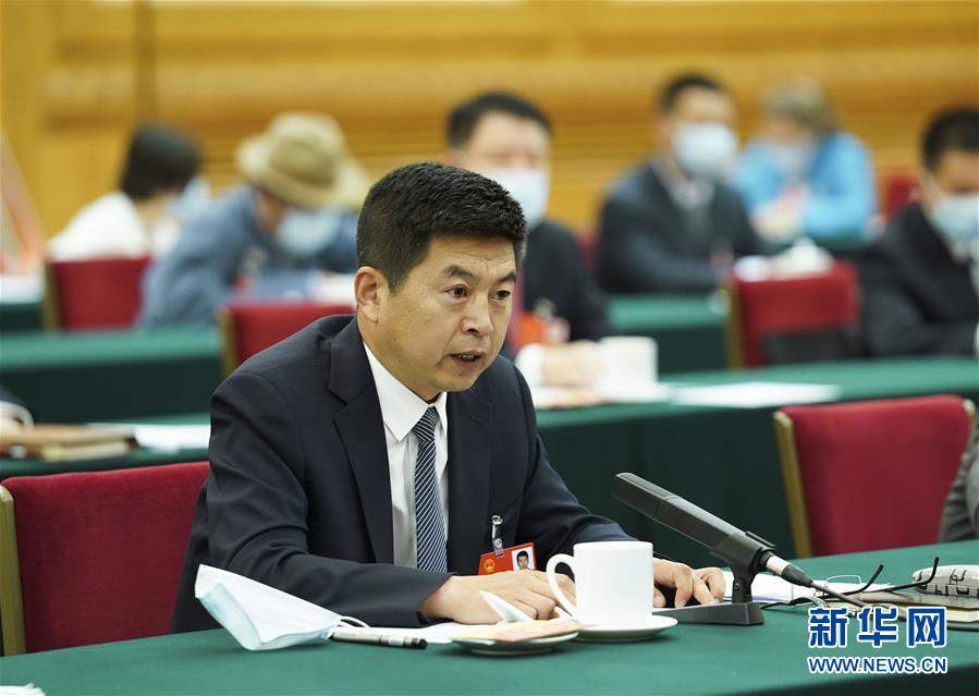 （新華全媒頭條·圖文互動(dòng)）（5）從人民中汲取磅礴力量——習(xí)近平總書記同出席2020年全國(guó)兩會(huì)人大代表、政協(xié)委員共商國(guó)是紀(jì)實(shí)
