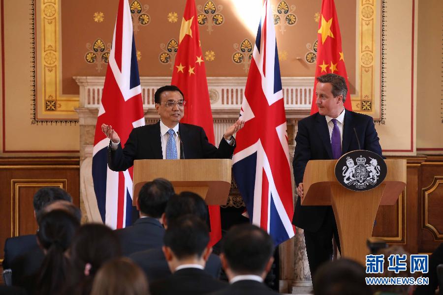 6月17日，國務(wù)院總理李克強同英國首相卡梅倫在倫敦舉行中英總理年度會晤后共同會見記者。新華社記者 龐興雷 攝