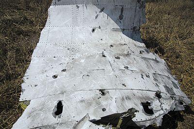 MH17墜機現場照片下藏著多少信息？