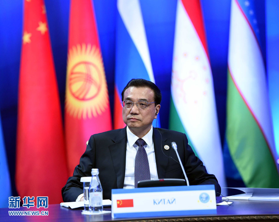 12月15日，中國國務(wù)院總理李克強(qiáng)在阿斯塔納出席上海合作組織成員國政府首腦理事會第十三次會議。 新華社記者 饒愛民 攝