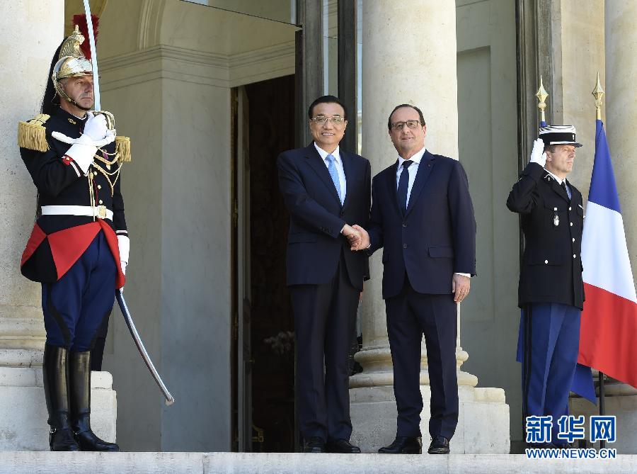 當?shù)貢r間6月30日下午，國務院總理李克強在巴黎愛麗舍宮會見法國總統(tǒng)奧朗德。 新華社記者李學仁攝